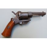 Belgian 6mm six-shot double action pinfire revolver with shaped wooden grips, folding trigger and