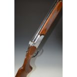 Midland 12 bore over and under shotgun with engraved lock, underside, trigger guard, top plate and