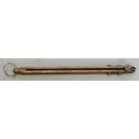 Brass in-line beam sprung percussion cap dispenser with belt loop, 14.5cm long.