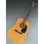 Mountain 6 acoustic guitar fitted with six steel strings, model W150, with soft gig bag