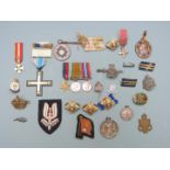 Small collection of militaria including miniature medals, veteran's badge, cloth Special Air Service