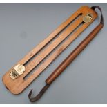 James Dixon & Sons wooden game carrier with brass mounts and wood and leather handle, 50cm long