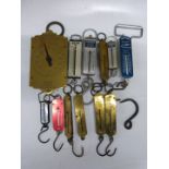 Twelve Salter spring balances including GPO 120lb, retro air travellers 50lb, Hughes's and Maw's