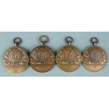 Four 1953/1954 Coronation bronze swimming medals for King Edward VII School, Sheffield, the
