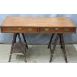 Mahogany campaign desk with two drawers, brass handles, escutcheons and fittings and folding trestle