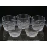 A set of five cut clear glass wine rinsing bowls with double spouts, each approximately 14cm in