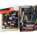 A large collection of Tri-ang, Hornby and similar 00 gauge model railway rolling stock including