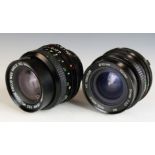 Two Vivitar SLR camera lenses comprising 24mm 1:2.0 and 28mm 1:2.0, both with Minolta mounts