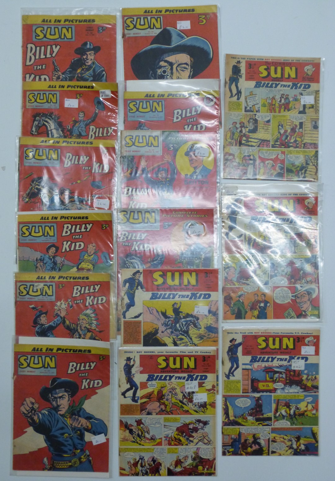 Fifteen Sun Weekly comic books dating from 1955-58.