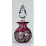 Laugharne cranberry glass scent bottle with 'silver' overlaid decoration of flowers and clear