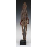 Sepik River, Papua New Guinea Oceanic carved ancestor figure on stand, H 33cm