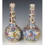 A pair of 19thC Chinese clobbered vases with dragon decoration, H16cm