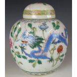 A 19th/20thC Chinese covered ginger jar with dragon decoration, H15cm