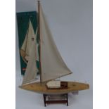 Graupner Collie kit built model pond yacht on stand, with original box.