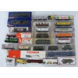 Twenty-nine Bachmann, Fleischmann and Roco 00 gauge model railway locomotives, and wagons