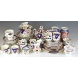A large collection of 19th/20thC English Imari teaware and a pair of Japanese vases