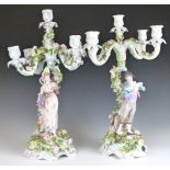 A pair of 19th/20thC German porcelain figural candelabra, H47cm