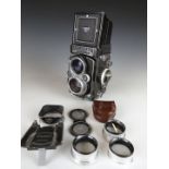 Rolleiflex 3.5F TLR camera, serial number 2212798, together with Rolleinar lenses, lens hood etc