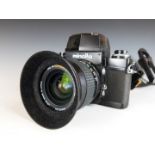 Minolta XM SLR camera with 28mm 1:2 lens