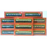 Eleven Tri-ang Hornby 00 gauge model railway passenger coaches comprising three rakes of coaches,