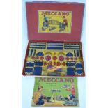 Meccano Outfit 3 with blue and gold parts and red wheels, in original box with instructions.