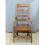 An 18th/19thC Welsh elm armchair, H109cm