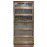 Globe Wernicke style six section glazed bookcase with drawer to base, W86 x D25 x H204cm