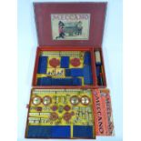 Meccano Outfit F with blue and gold parts, in original box with instructions.