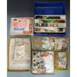 A box of loose stamps and sundries with many issues still in original packets