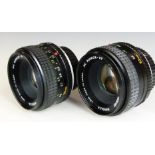 Two Minolta Rokkor 50mm 1:1.7 SLR camera lenses