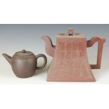 Two Chinese Yixing teapots and covers including a calligraphy example, tallest 12.5cm