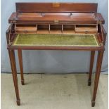 A mahogany desk with lift up lid and slide out leather inset surface and fitted interior, W85 x