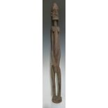 African tribal carved figure of elongated form, probably 19thC, H120cm