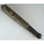 A 19th/20thC oriental possibly Chinese bronze cosh or club with relief moulded snake decoration,