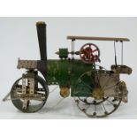 Meccano or Butcher & Sons Primus model of a steam roller made using red, green and black parts, 43cm