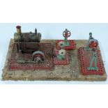 Mamod SE2 live steam engine on base together with line shaft, power press and buffing wheel