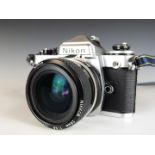 Nikon FE2 SLR camera with 28mm 1:2.8 lens