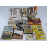 A collection of Airfix, Ratio, Dapol and similar white metal and plastic model kits including