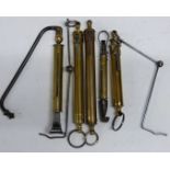 Five Salter spring balances comprising three ratcheting examples, one with ministry broad arrow mark