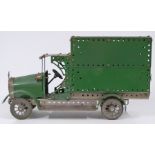 Meccano or Butcher & Sons Primus model of a lorry made using green and unpainted parts, 38cm long.