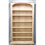Three pine bookcases each approximately, W120 x D34 x H212cm