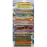 Forty-five TV and Western related annuals and books including Hopalong Cassidy, Laramie, Gunsmoke,