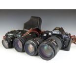 Two Nikon SLR cameras comprising F-501 and F-801, with four Nikon lenses, comprising 24mm 1:2.8,