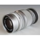 Leitz Elmar f=9cm 1:4 camera lens, serial number 1603841, with Leica type screw mount, in bubble