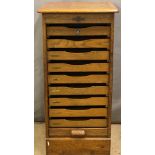 Crusader oak tambour fronted collector's chest or filing cabinet with nine drawers, brass fittings