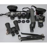 Olympus OM10 SLR camera with 50mm 1:1.8 lens and Vivitar 1:3.5-4.5 28-70mm lens,  Pedixa Prismat TTL