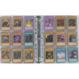 An album of over 1000 Konami Yu-Gi-Oh trading cards including shiny examples.