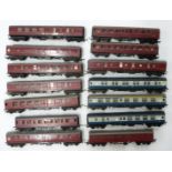 Fourteen Tri-ang and Tri-ang Hornby 00 gauge model railway coaches.