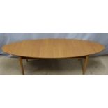 A retro style elliptical coffee table with undershelf, W170 x D60 x H45cm