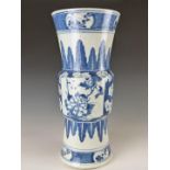 WITHDRAWN    A 19thC Chinese blue and white Gu vase with stylised acanthus leaf and prunus